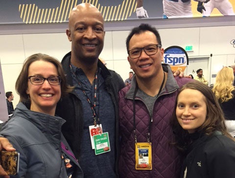 Lydia Bergen, director of operations for the Football Players Health Study (left), Alix Nozzolillo, associate director of player relations (right), with Nolan Harrison and Dat Nguyen, player advisors for the Study, at Super Bowl 50.